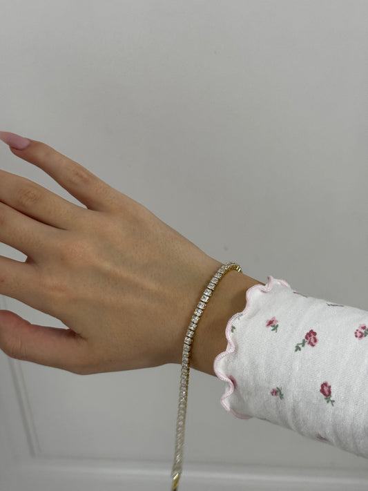 Gold tennis bracelet