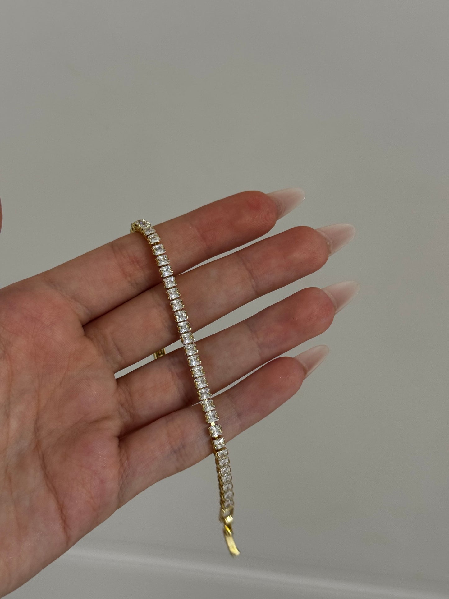 Gold tennis bracelet