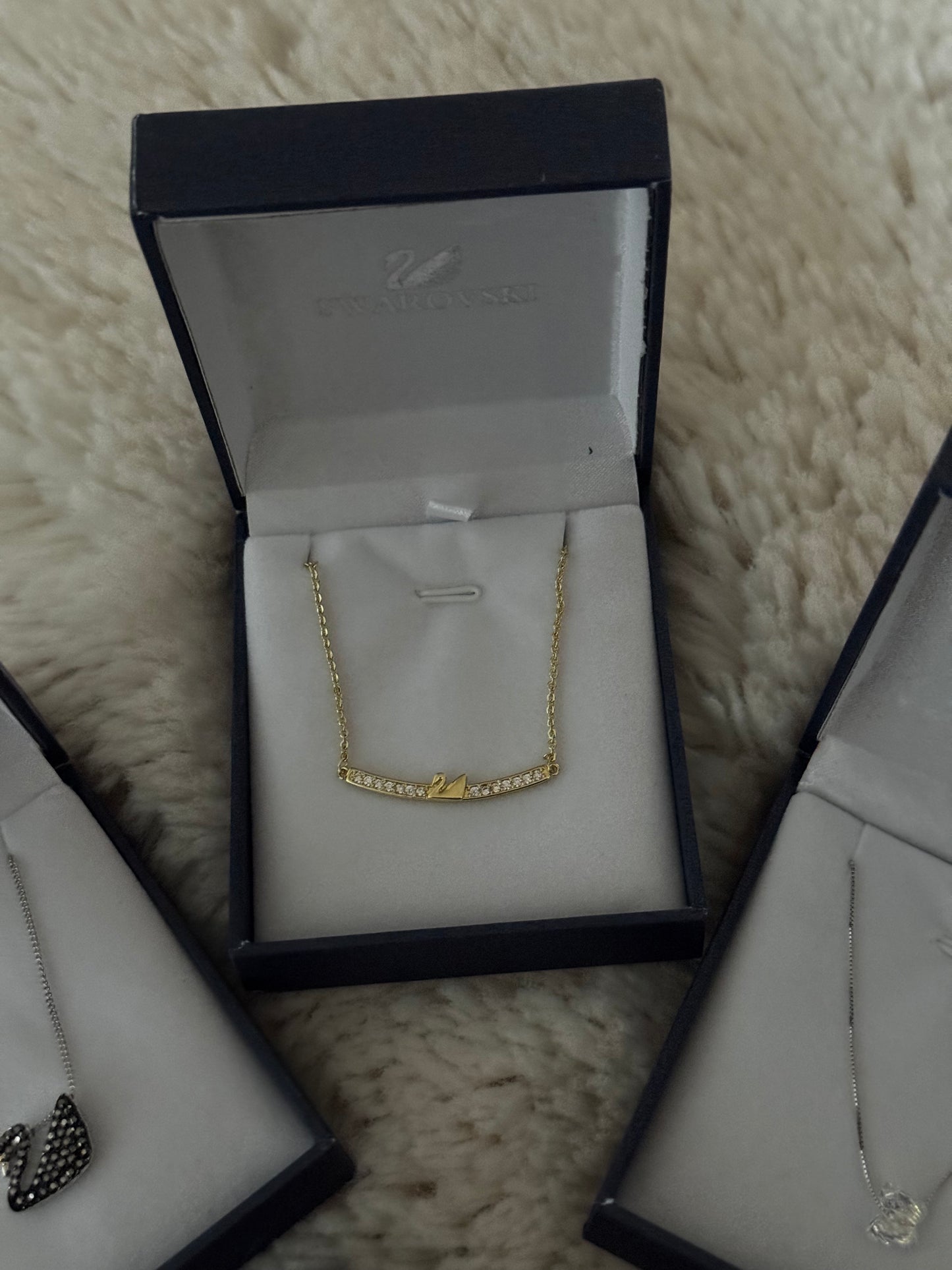 Swan necklaces